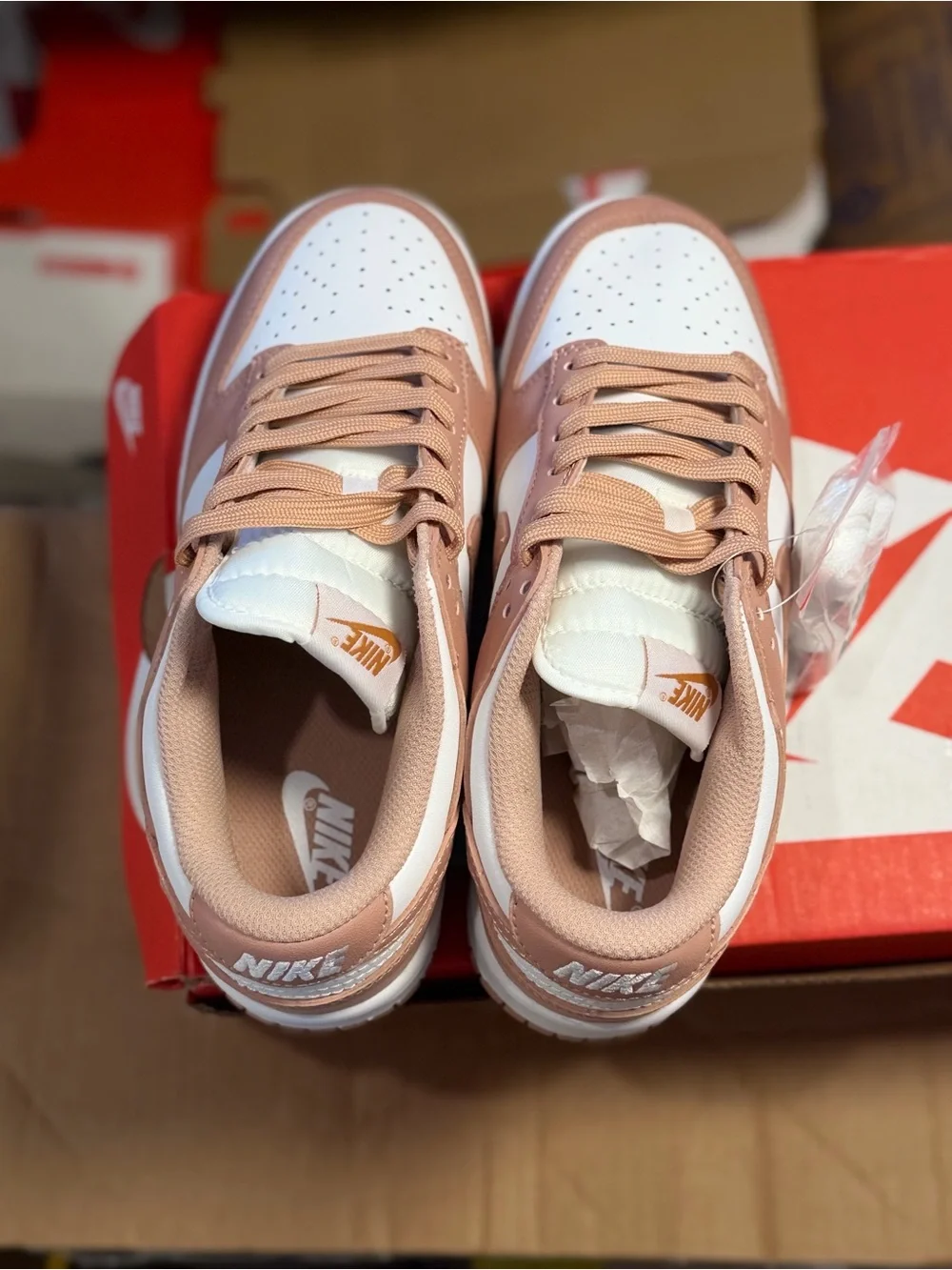 Nike Women’s Low-Top Sneakers in Blush Pink and White